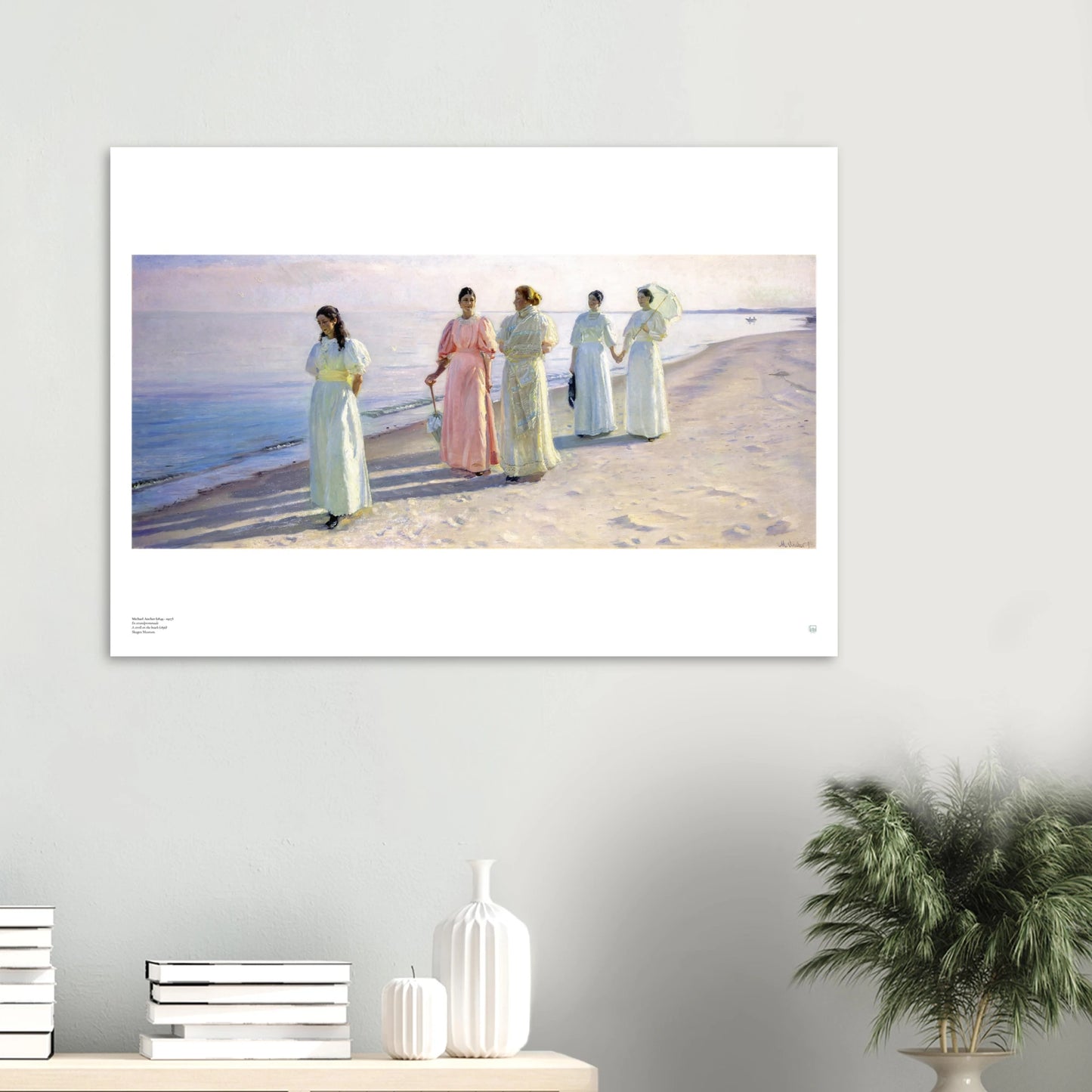 Michael Ancher A Stroll on the Beach En strandpromenade Danish art print poster shown on a wall in a Scandinavian interior