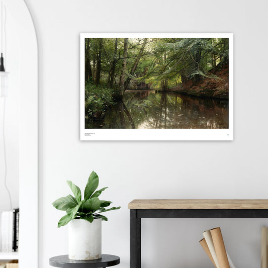 Peder Mørk Mønsted A Spring Day in the Forest at Sæby Å Danish art print poster shown framed on a wall in a Scandinavian interior