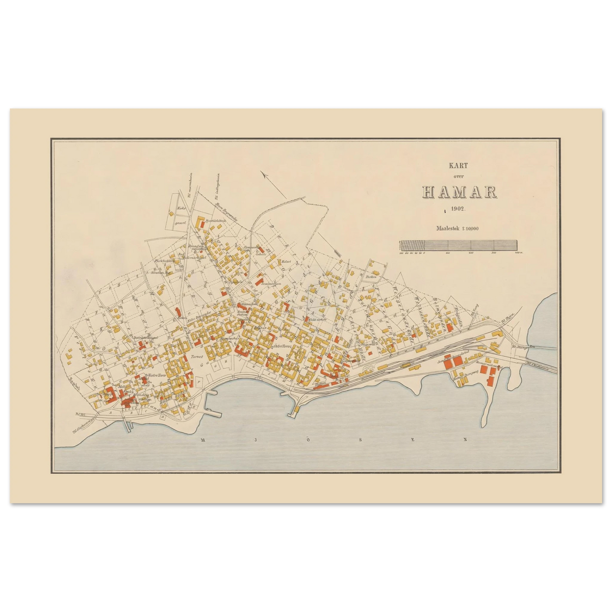 Hamar city map poster from 1902 with Norwegian place labels, a black outlined border and pale blue water along the lower edge.