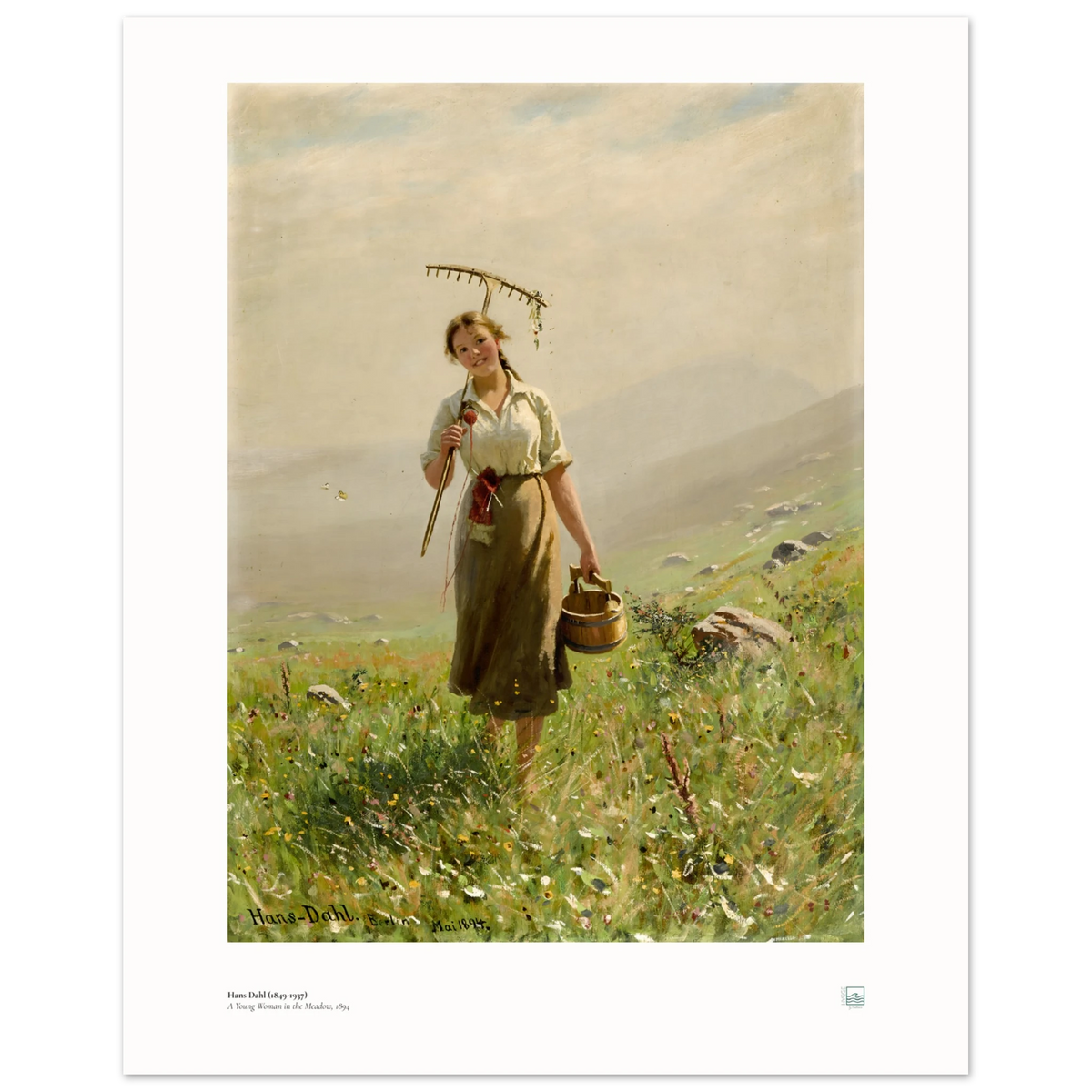 Hans Dahl’s A Young Woman in the Meadow (1894), 40 × 50 cm poster with white border, showing a woman with rake and wooden pail among wildflowers.