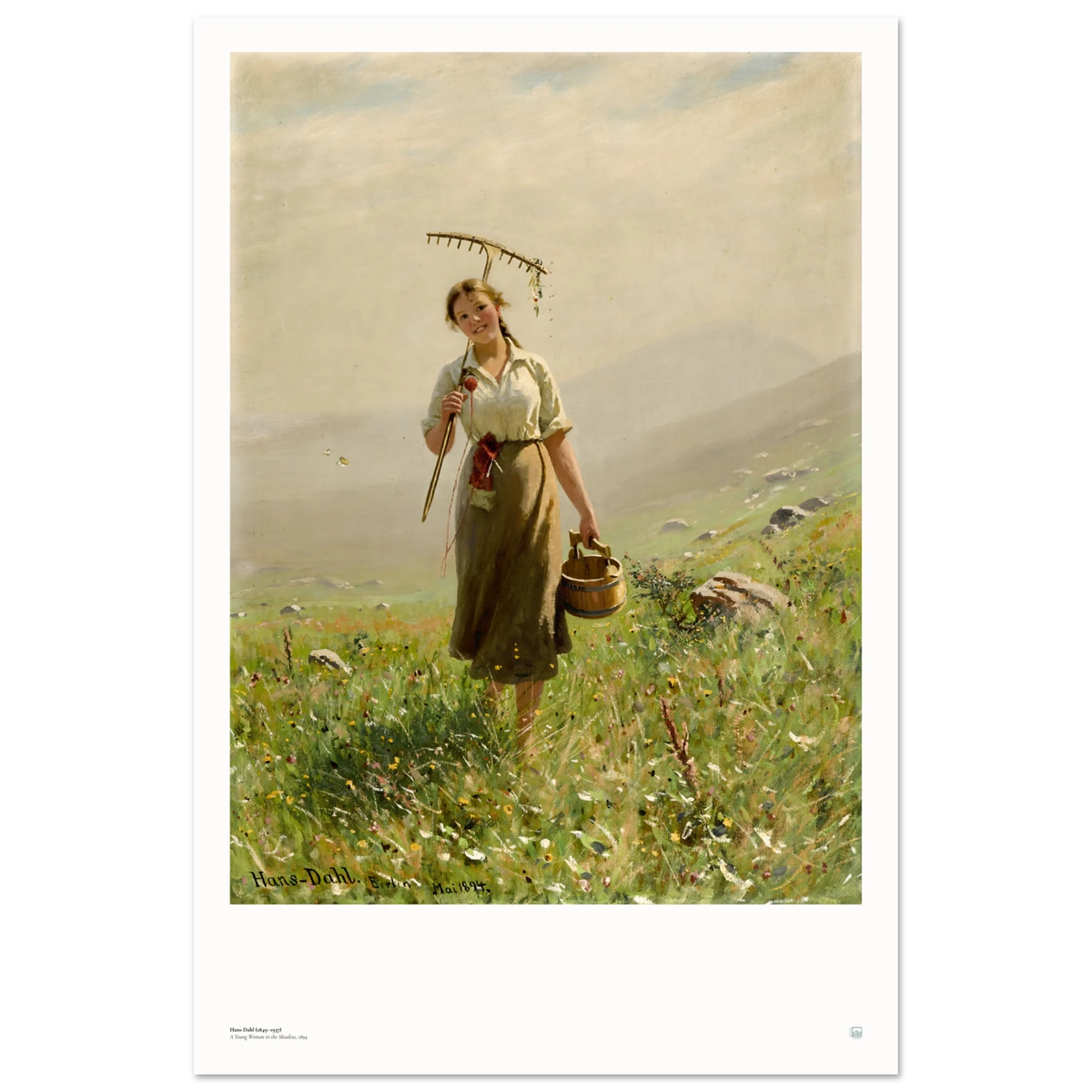Hans Dahl’s A Young Woman in the Meadow (1894), 60 × 90 cm poster with white border, showing a woman with rake and wooden pail among wildflowers.